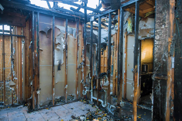 Professional Emergency Fire Damage Restoration technician working in New Auburn, MN